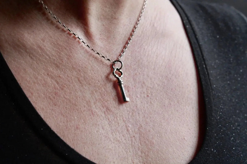 Tiny silver Key Pendant Curiouser Collective